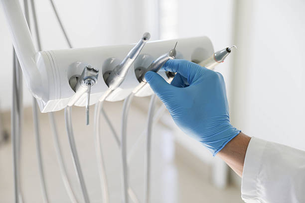Professional Root Canal Treatment technician working in Hampton Bays, NY